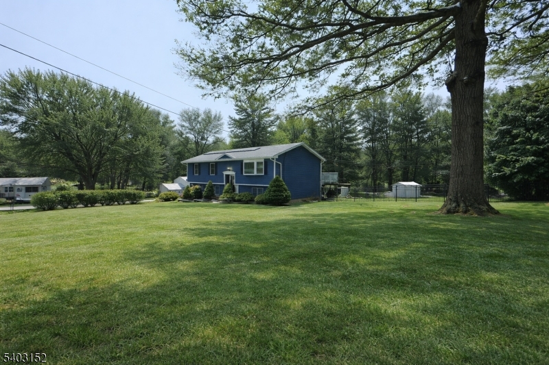 2 Robert Street Flanders, NJ 07836 - Photo 33 of 38 a view of house with backyard space and garden
