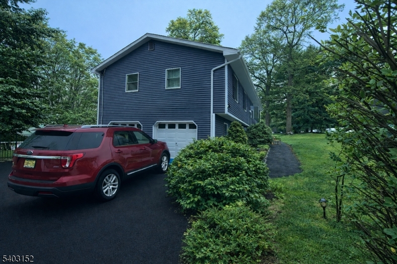 2 Robert Street Flanders, NJ 07836 - Photo 36 of 38 a car parked in front of a house