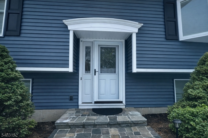 2 Robert Street Flanders, NJ 07836 - Photo 4 of 38 a front view of a house with a garden