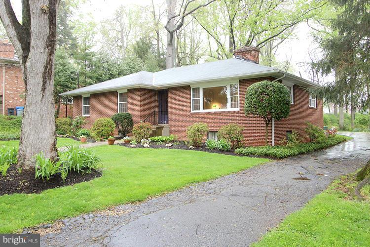 5812 Conway Road Bethesda, MD 20817 - Photo 2 of 25 Long driveway to rear, 2-car garage