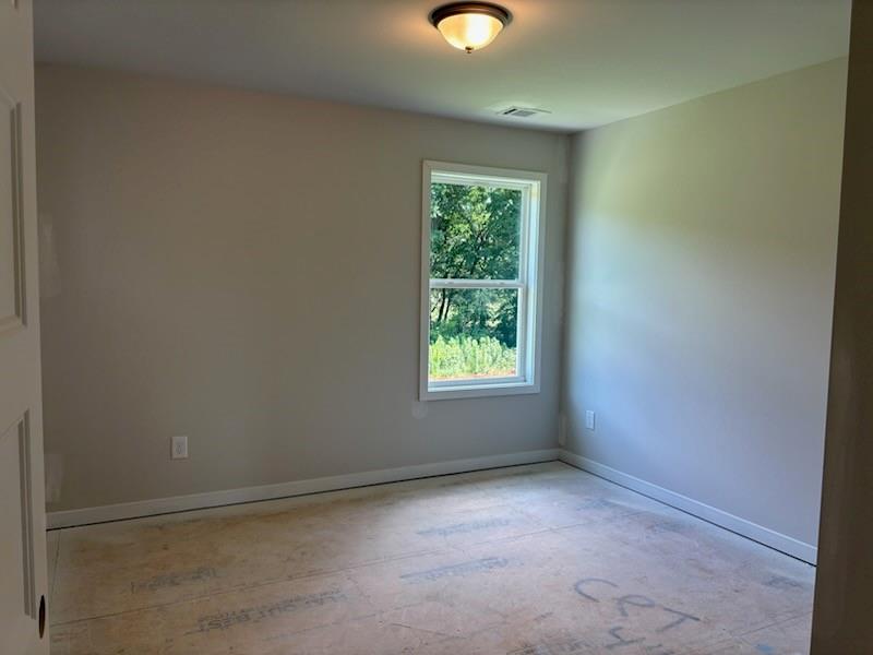 6 Commons Way Cartersville, GA 30120 - Photo 16 of 37 an empty room with windows