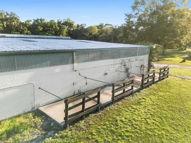 a view of an empty room with stairs