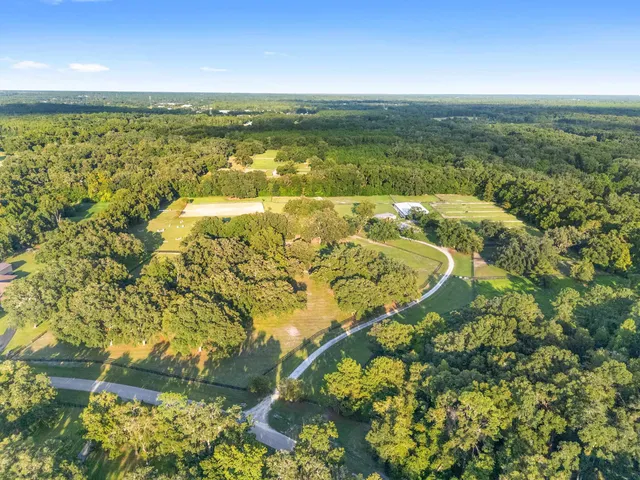a view of a golf course with a lake view