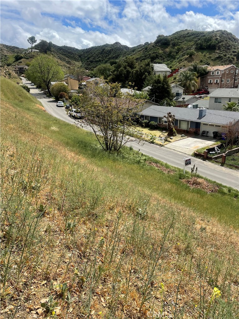 14 Driver Avenue Val Verde, CA 91384 - Photo 10 of 14 a view of a lake with houses