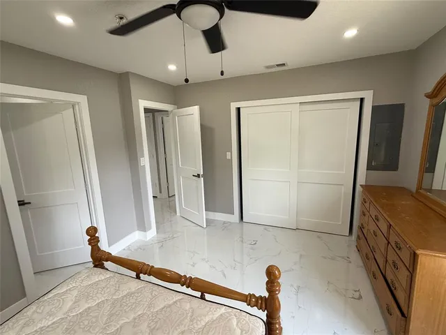 a bathroom with a tub and a shower