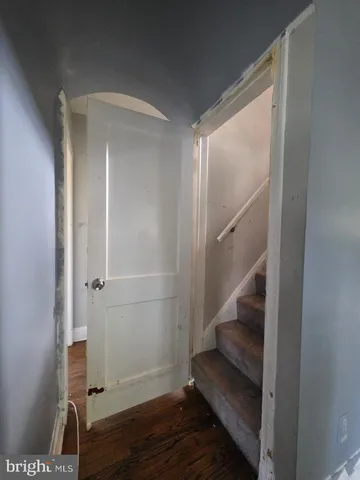 a view of entryway with wooden floor