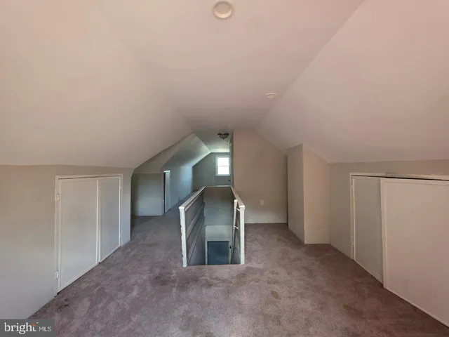 a view of a big room with a fireplace