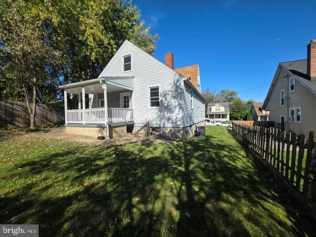 a front view of a house with yard