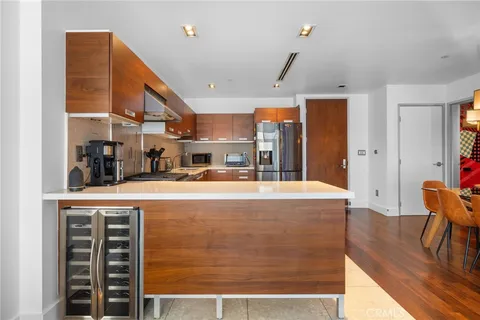 a stove top oven sitting inside of a kitchen