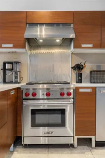 a view of a bedroom with washer and dryer