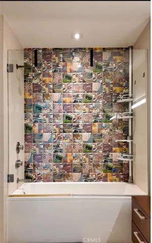 a bathroom with a sink a toilet and a bathtub