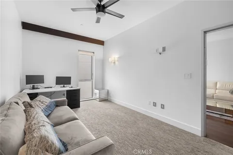 a room with gym equipment and a window