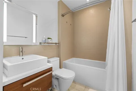 a room with gym equipment and a window