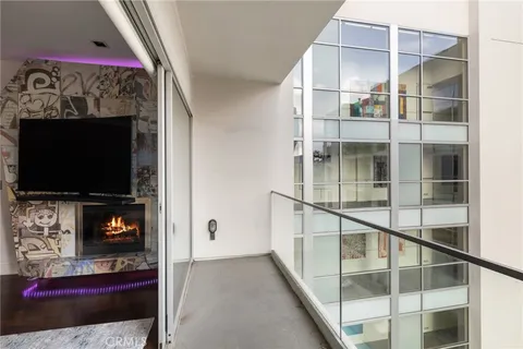 a view of a building with sitting area