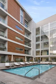 a kitchen with stainless steel appliances a stove and a refrigerator