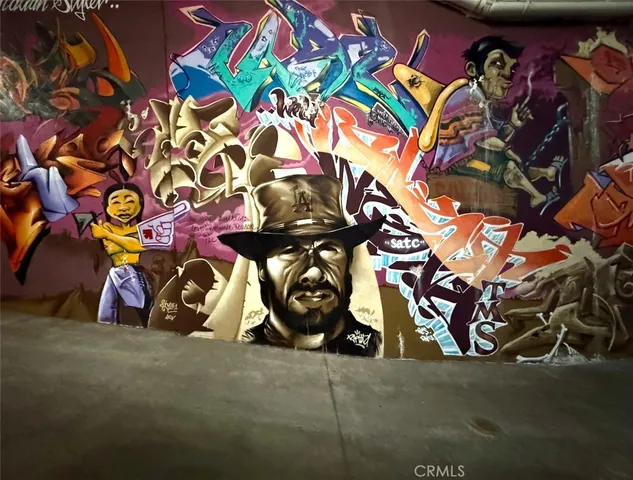 a living room with furniture chandelier and a chandelier