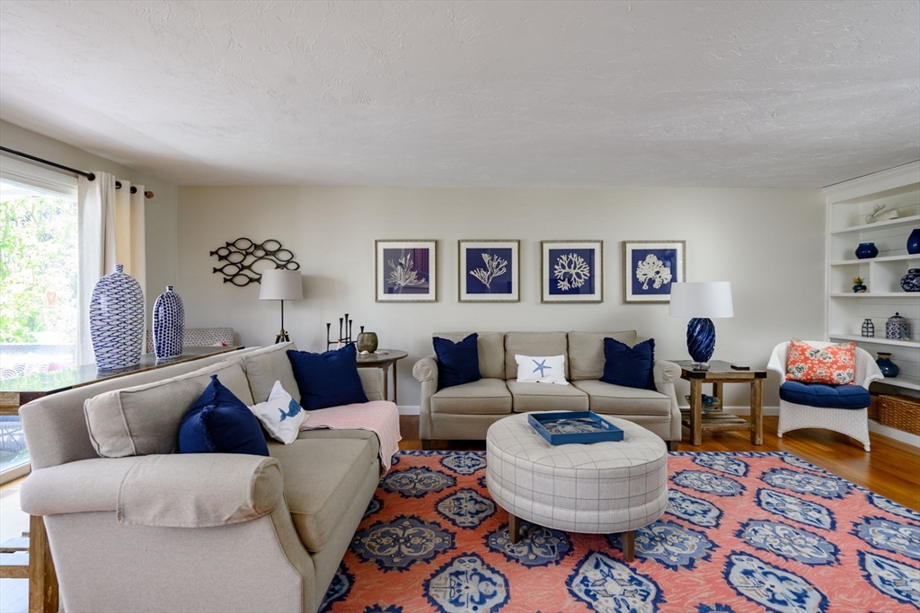 21 Hatherly Road, Unit 21 Scituate, MA 02066 - Photo 7 of 38 a living room with furniture and a rug