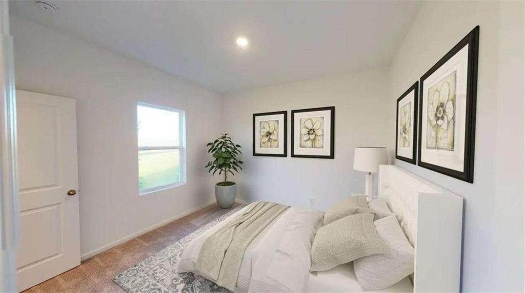 132 Galilee Lane Bethlehem, GA 30620 - Photo 9 of 13 a bedroom with a bed and a window