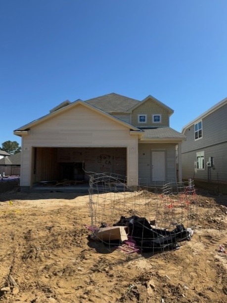 13671 Kit Run Splendora, TX 77372 - Photo 2 of 42 a front view of a house with a yard