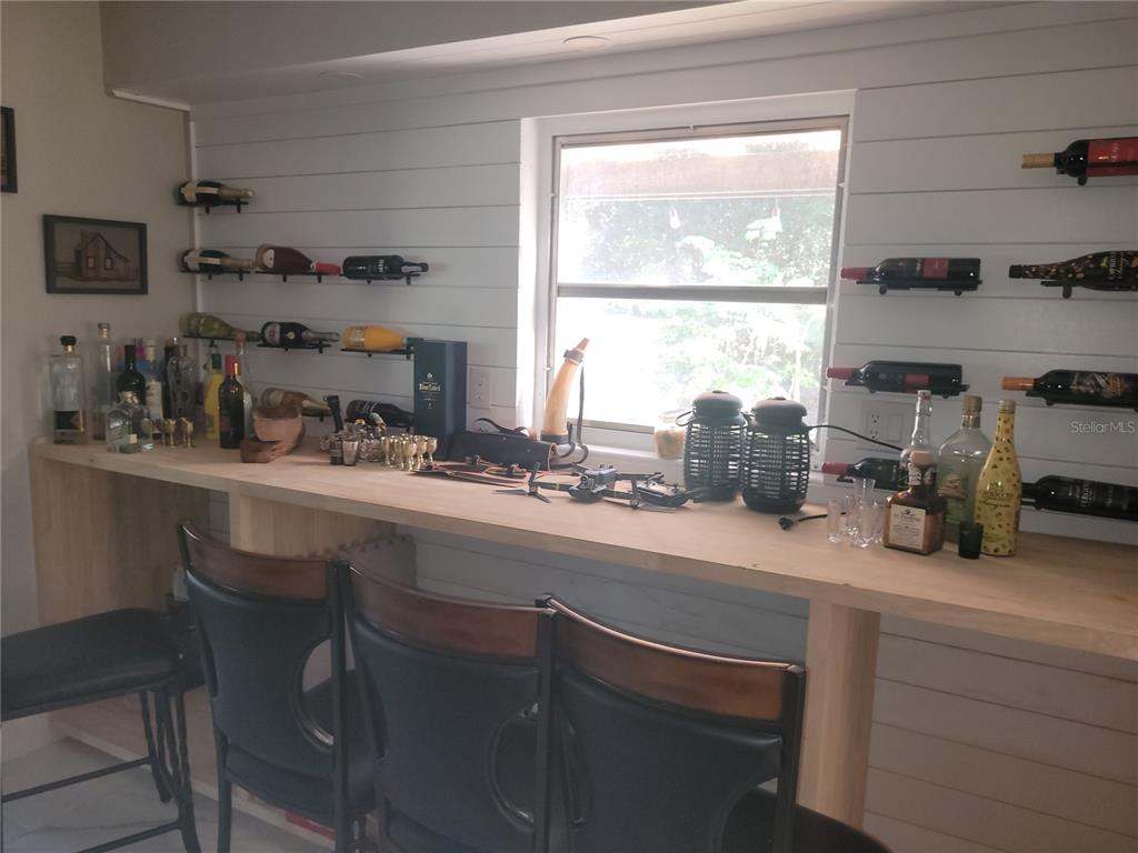821 South Honey Way Inverness, FL 34450 - Photo 17 of 38 a kitchen with a sink cabinets and a window