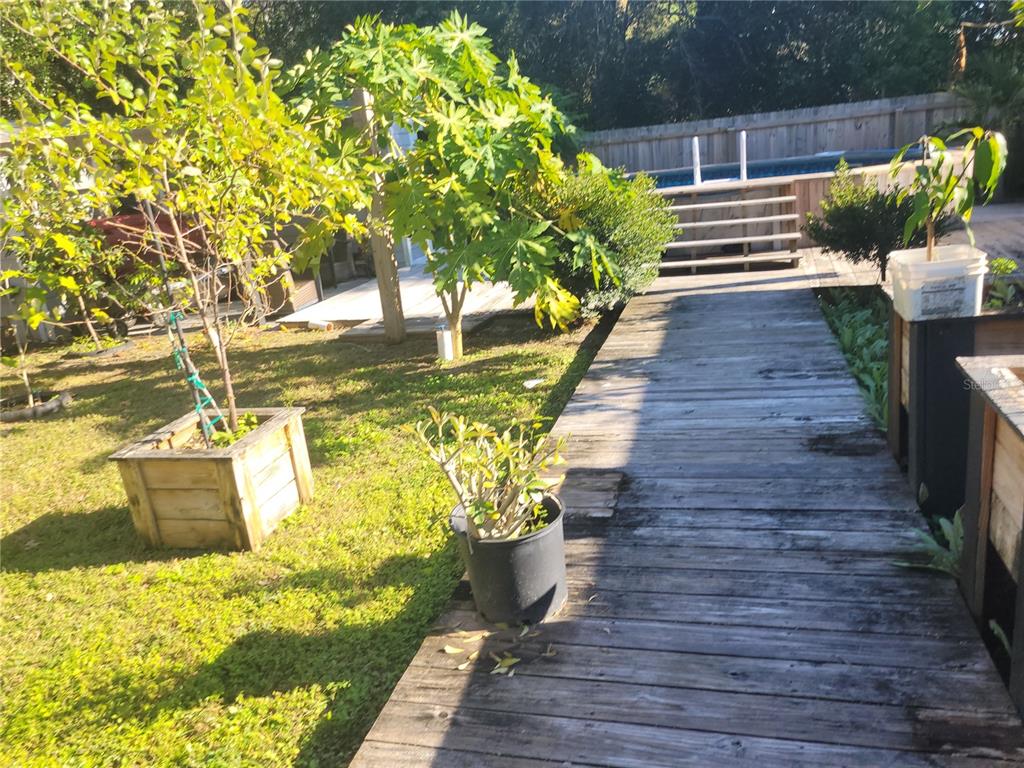 821 South Honey Way Inverness, FL 34450 - Photo 29 of 38 a view of a garden with wooden floor