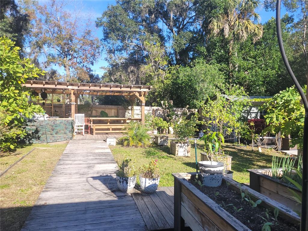 821 South Honey Way Inverness, FL 34450 - Photo 31 of 38 swimming pool view with a seating space