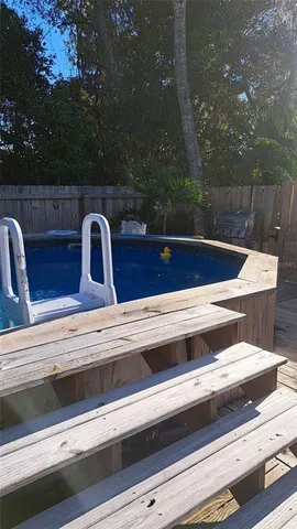 a view of a backyard of the house