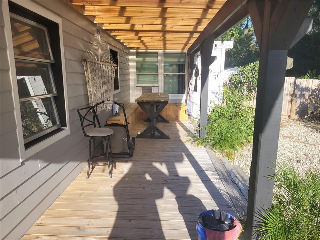 821 South Honey Way Inverness, FL 34450 - Photo 36 of 38 a balcony view with a couple of chairs and a potted plant