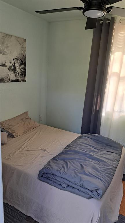 821 South Honey Way Inverness, FL 34450 - Photo 37 of 38 a bed sitting in a bedroom next to a window