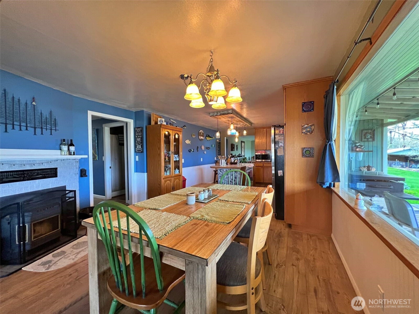 278 Wilson Road Mossyrock, WA 98564 - Photo 27 of 33 a view of a dining room with furniture window and wooden floor