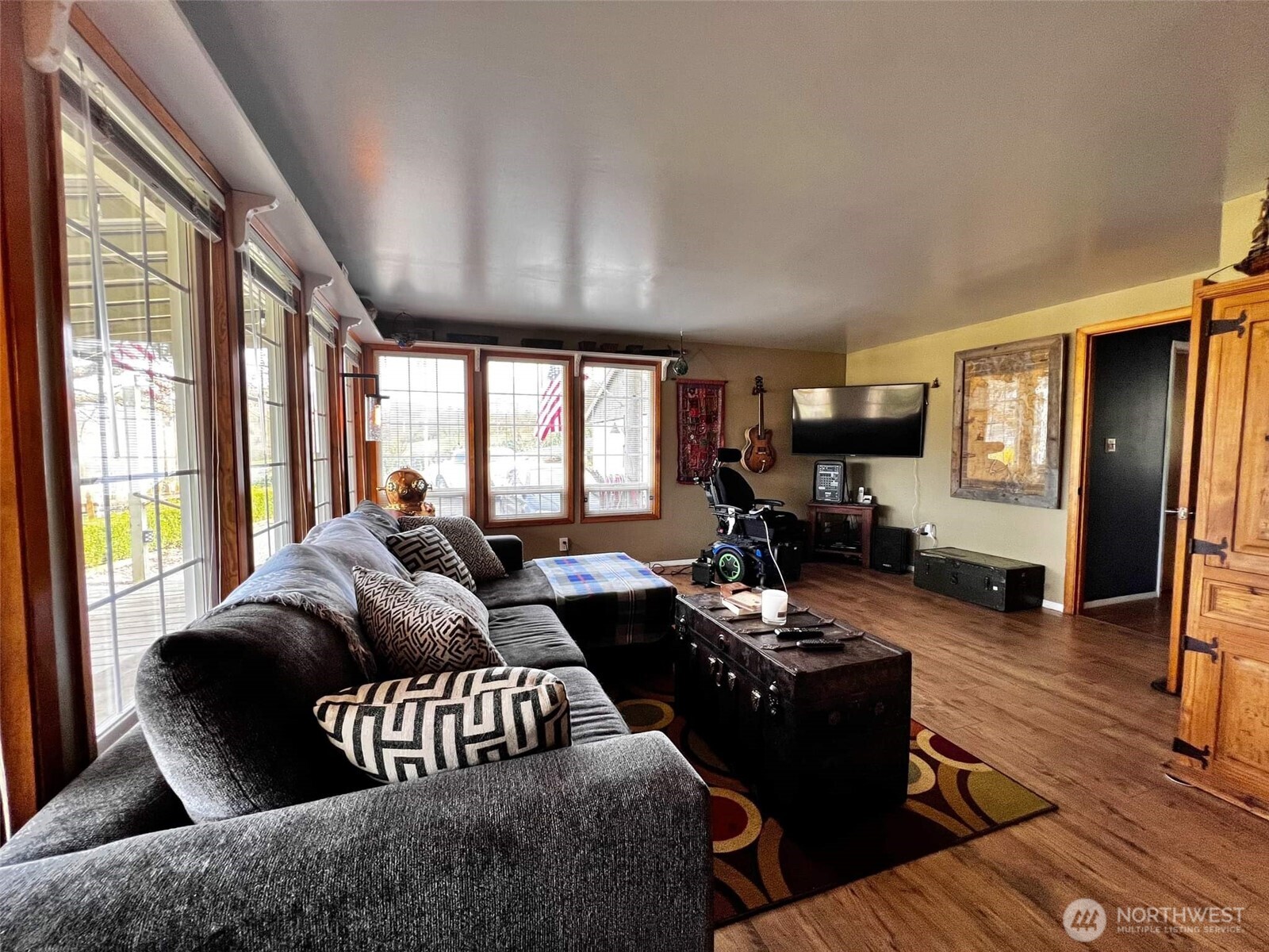 278 Wilson Road Mossyrock, WA 98564 - Photo 29 of 33 a living room with furniture fireplace and a large window