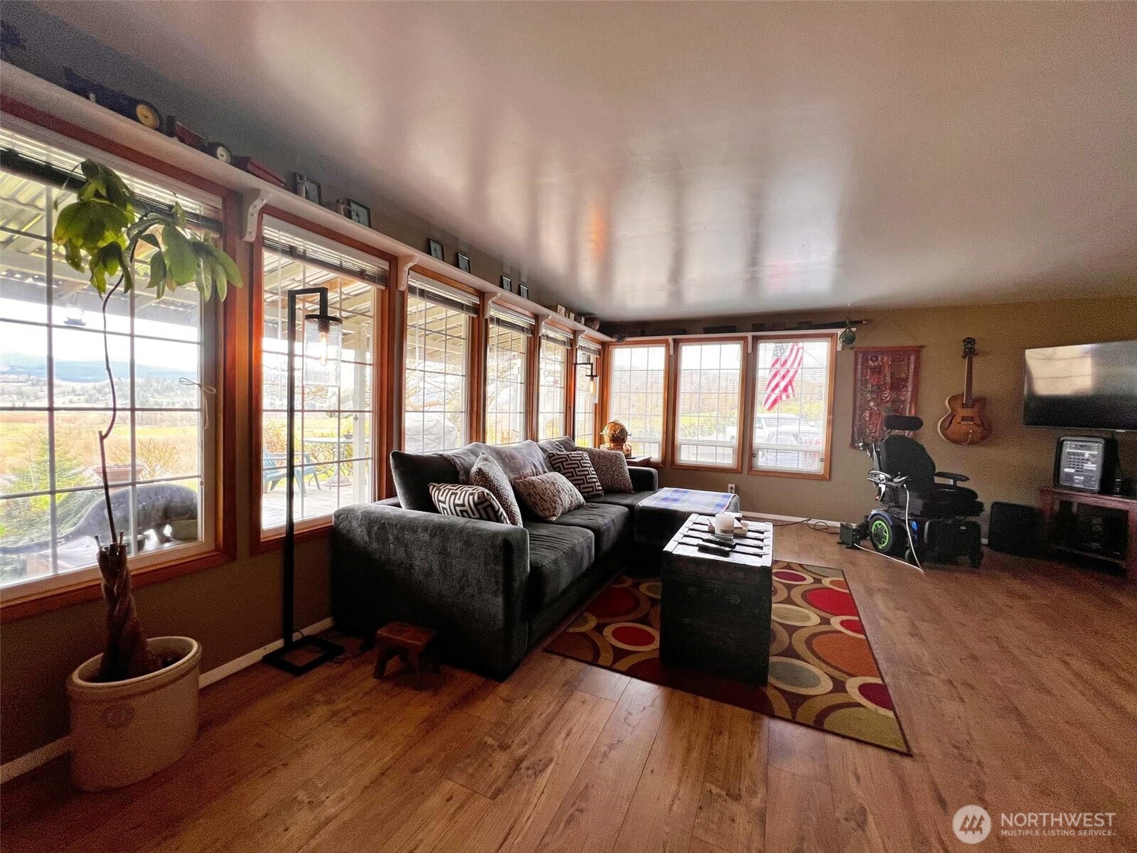 278 Wilson Road Mossyrock, WA 98564 - Photo 30 of 33 a living room with furniture and a flat screen tv