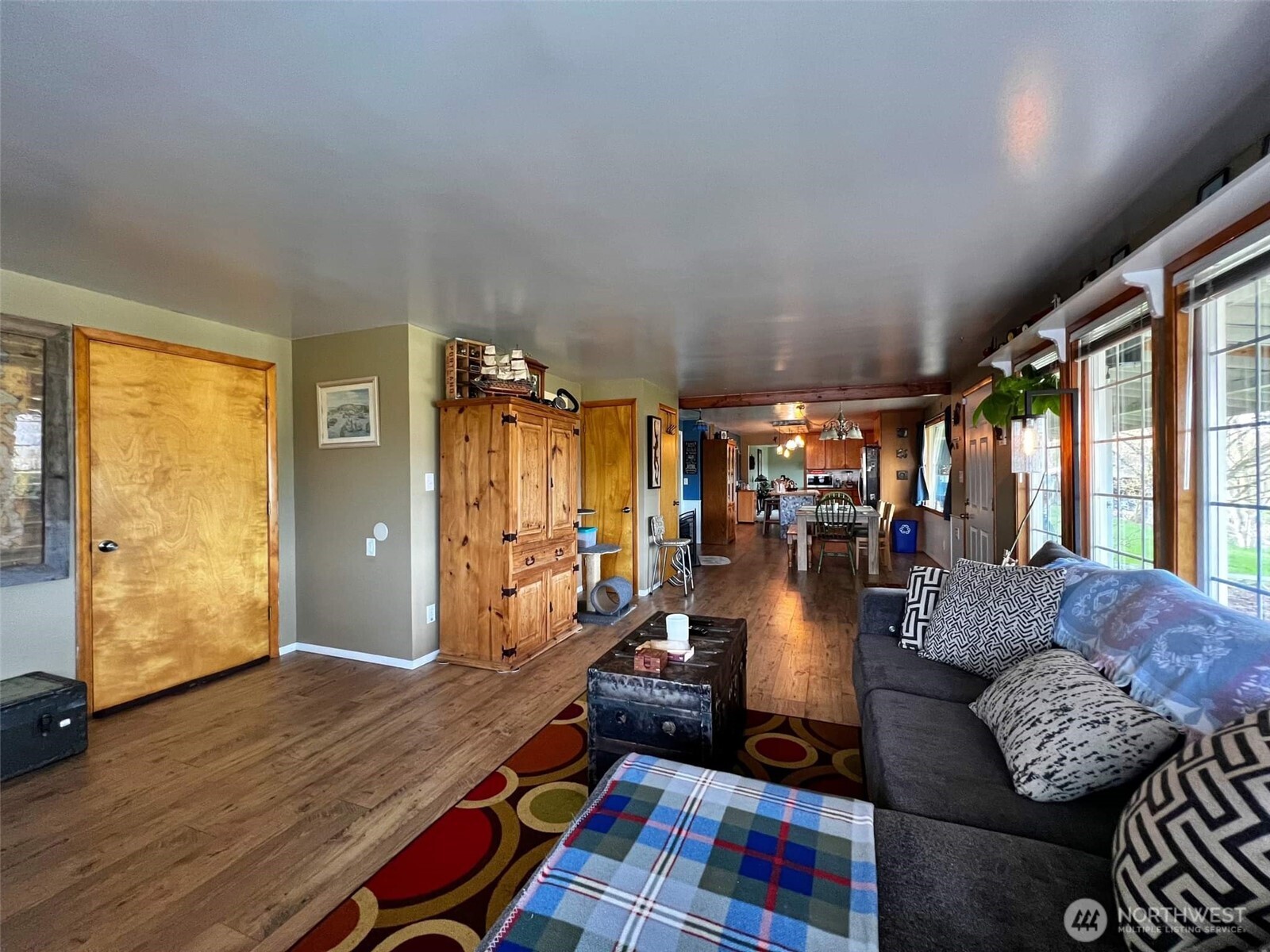278 Wilson Road Mossyrock, WA 98564 - Photo 31 of 33 a living room with furniture and a floor to ceiling window