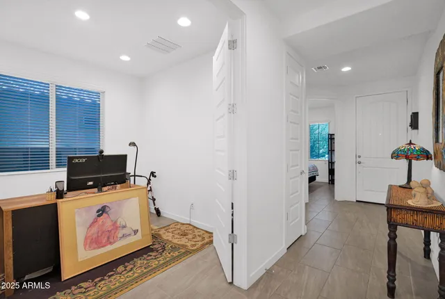 a view of kitchen with furniture and flat screen tv