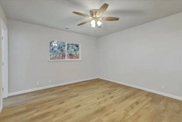 a view of a city with mountains in the background