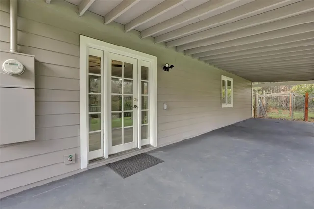 an aerial view of a house with outdoor space