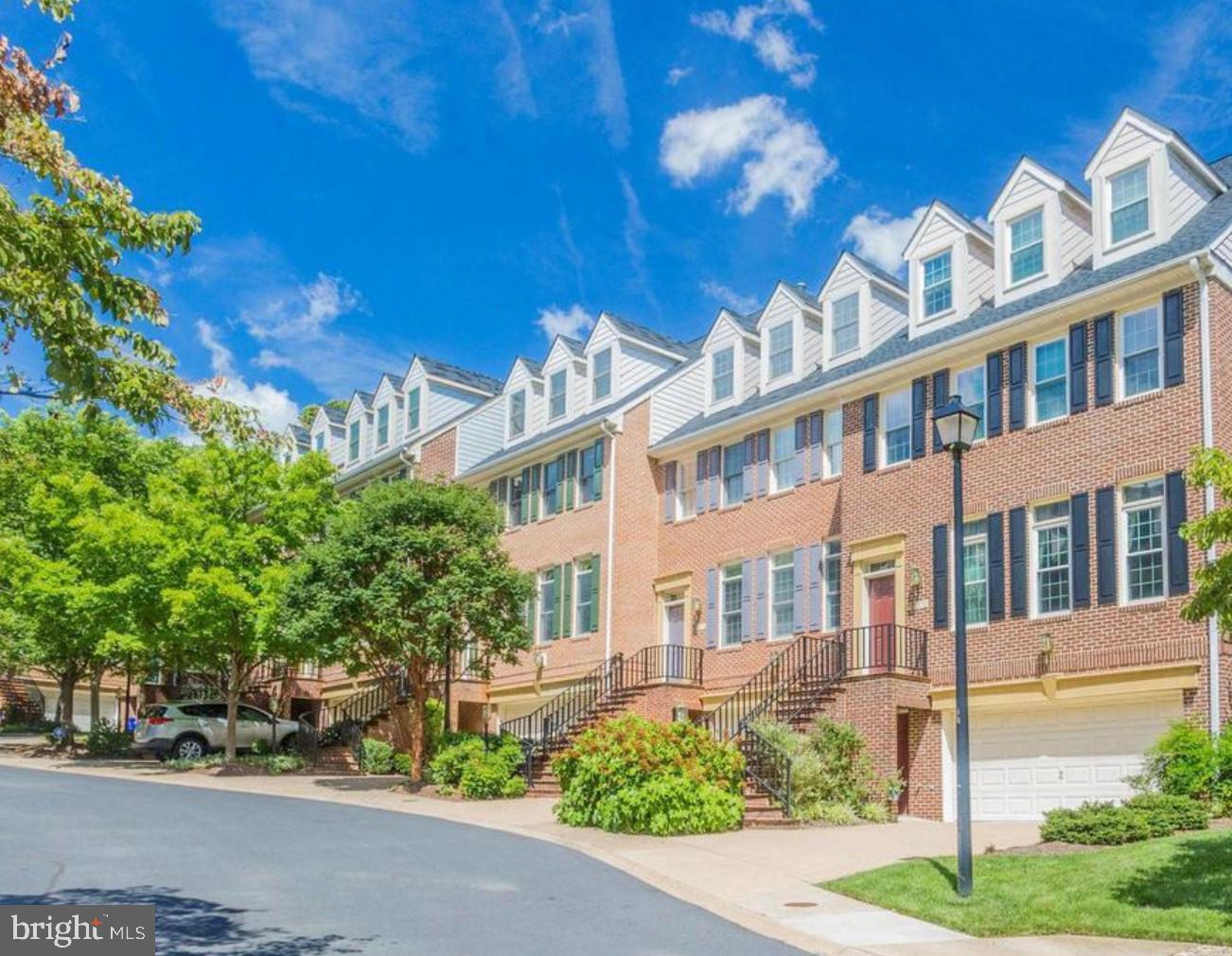 a front view of a building with garden