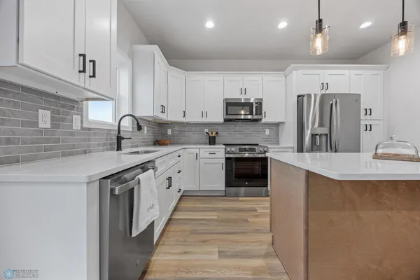 $493,000 | 5840 James Drive West, West Fargo, ND 58078