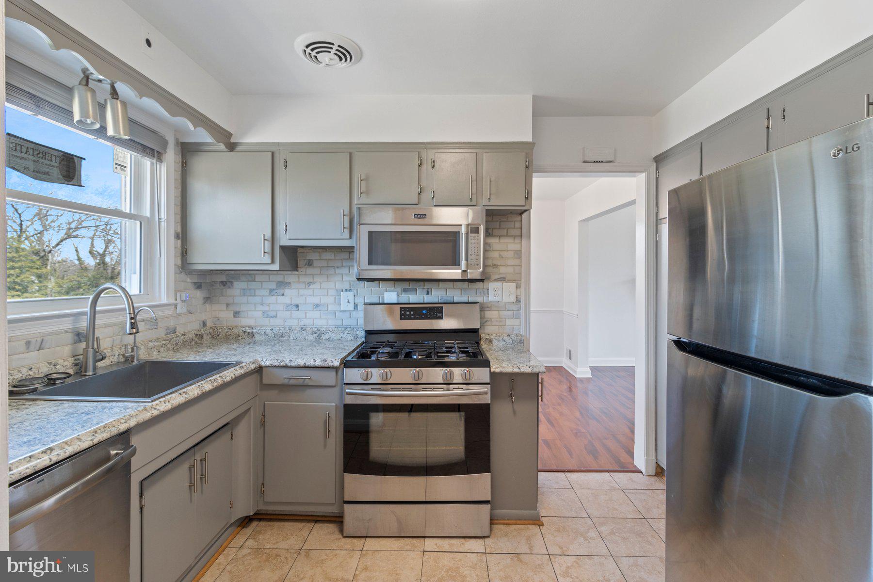 32 Gorsuch Road Lutherville-Timonium, MD 21093 - Photo 15 of 40 View into the dining room