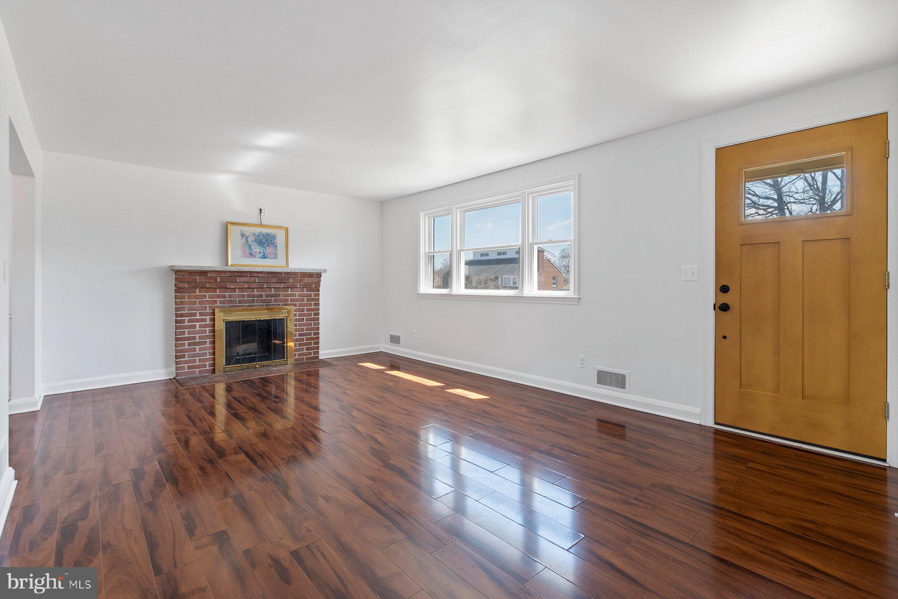 32 Gorsuch Road Lutherville-Timonium, MD 21093 - Photo 7 of 40 Wood burning fire place and new front door!