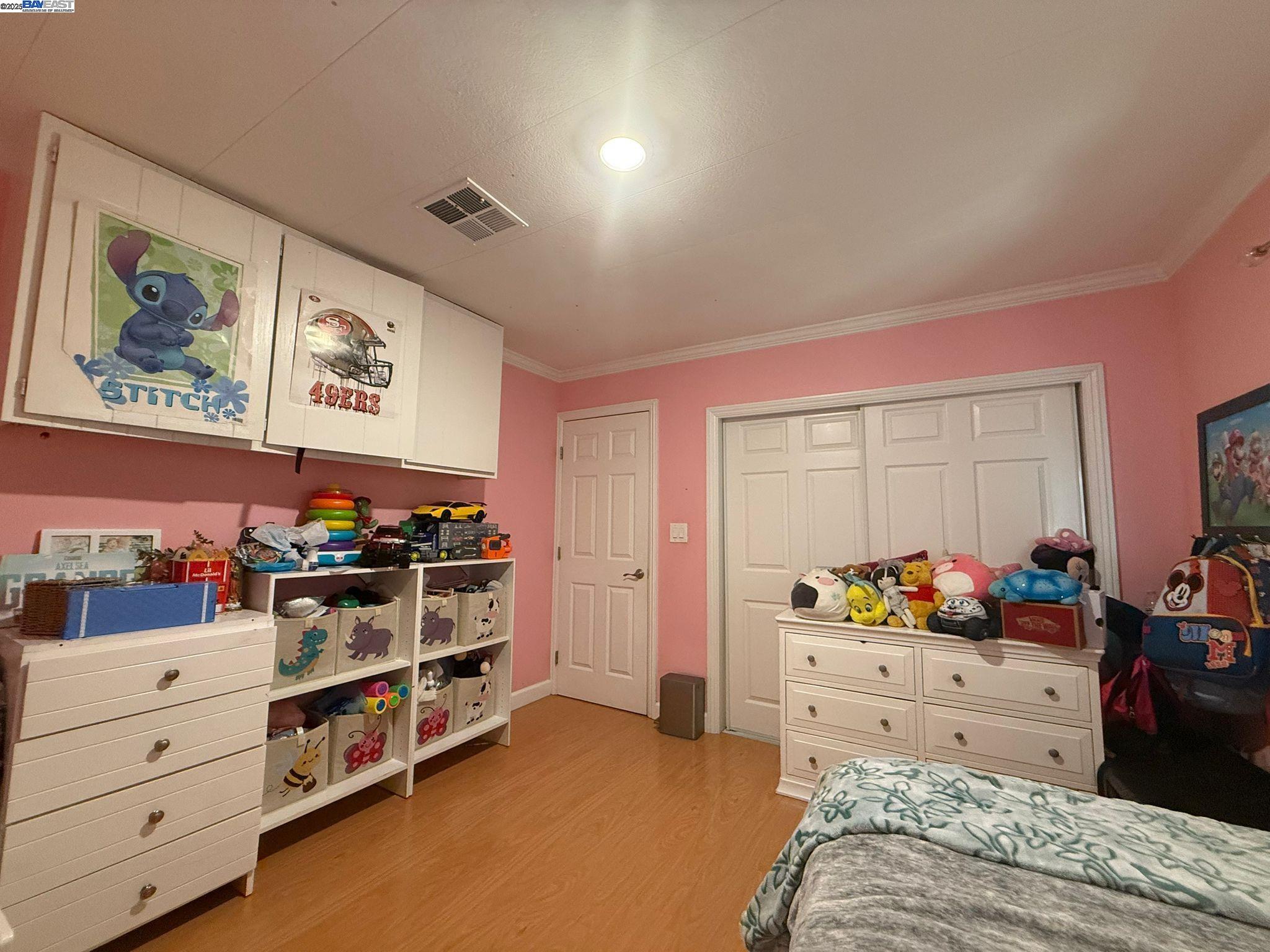 28290 Applegate Street Hayward, CA 94545 - Photo 11 of 20 a bedroom with furniture and a window