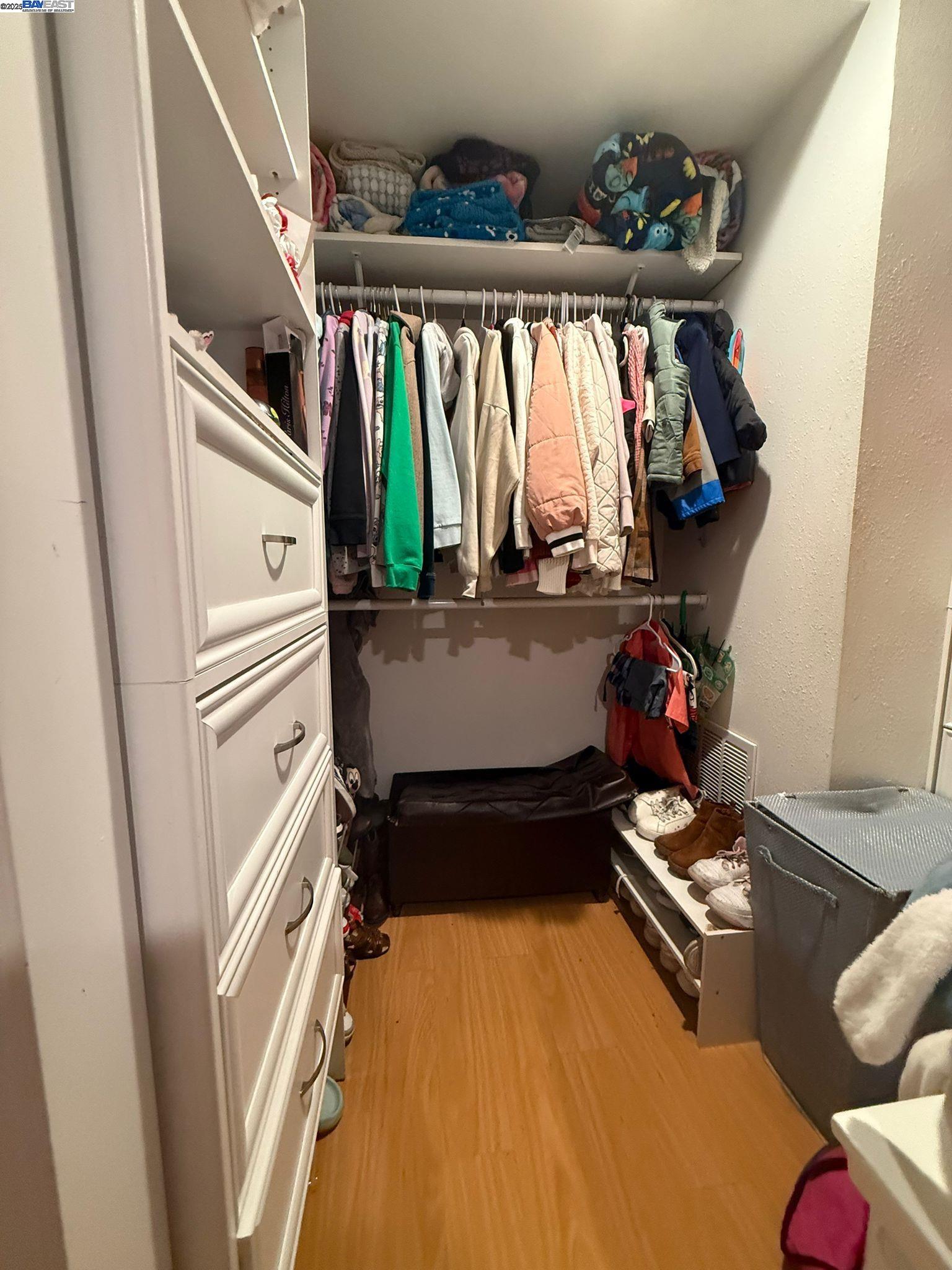 28290 Applegate Street Hayward, CA 94545 - Photo 13 of 20 a view of walk in closet with clothes and shoes