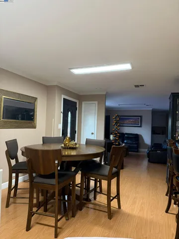 a view of a dining room with furniture