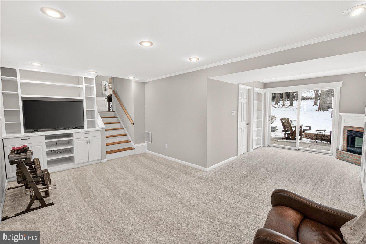 24013 Bush Hill Road Gaithersburg, MD 20882 - Photo 25 of 38 a livingroom with furniture and a flat screen tv