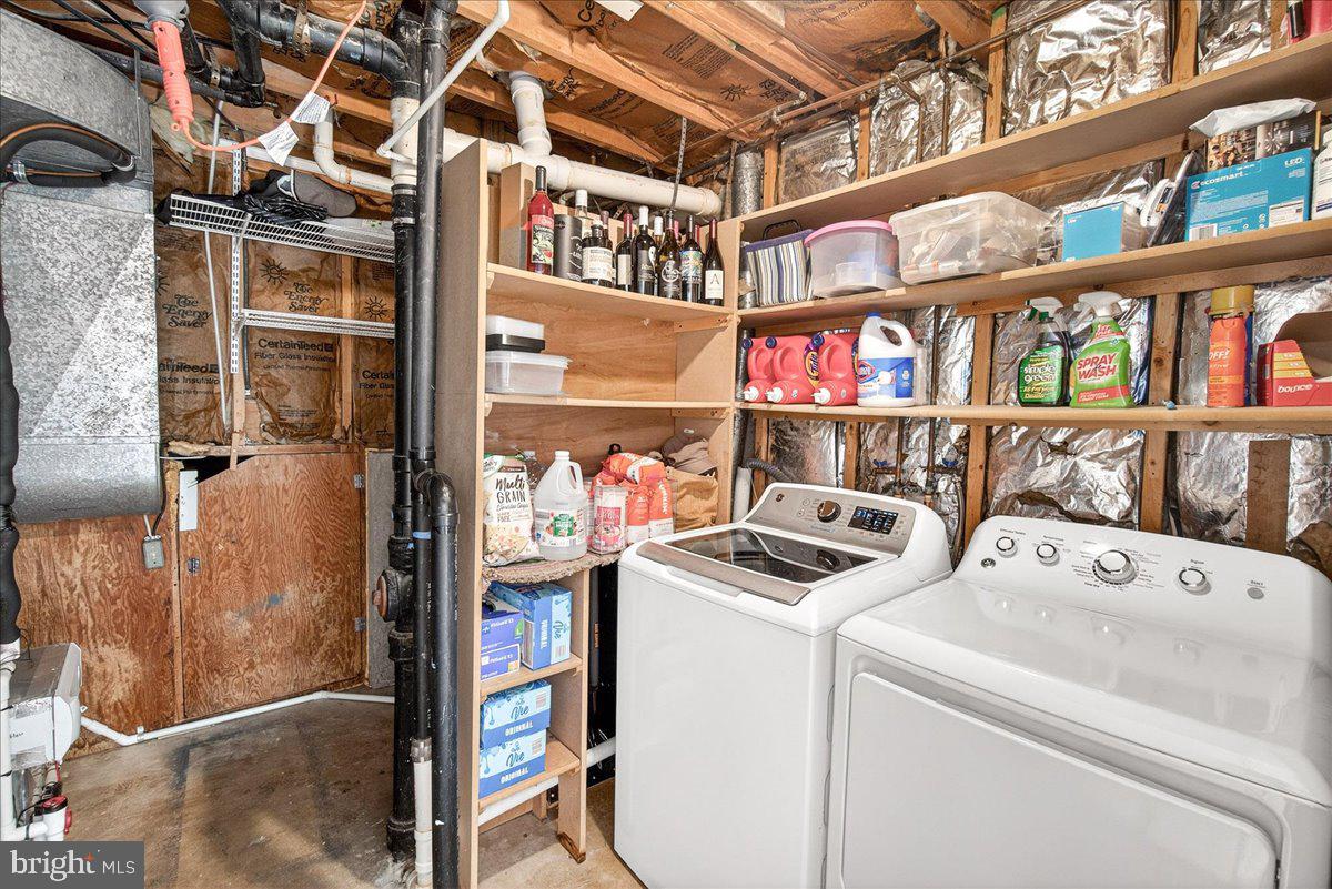 24013 Bush Hill Road Gaithersburg, MD 20882 - Photo 26 of 38 a utility room with dryer and washer