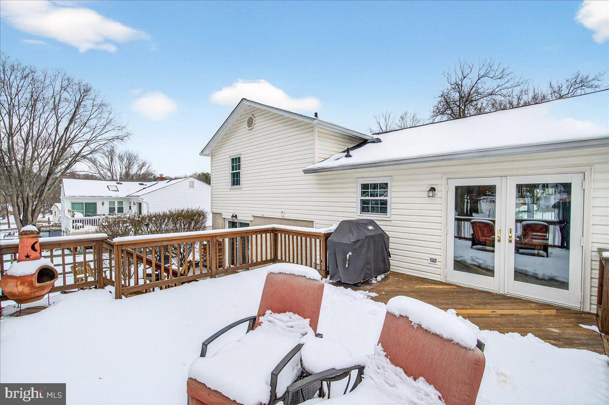 24013 Bush Hill Road Gaithersburg, MD 20882 - Photo 28 of 38 a view of a balcony with outdoor seating