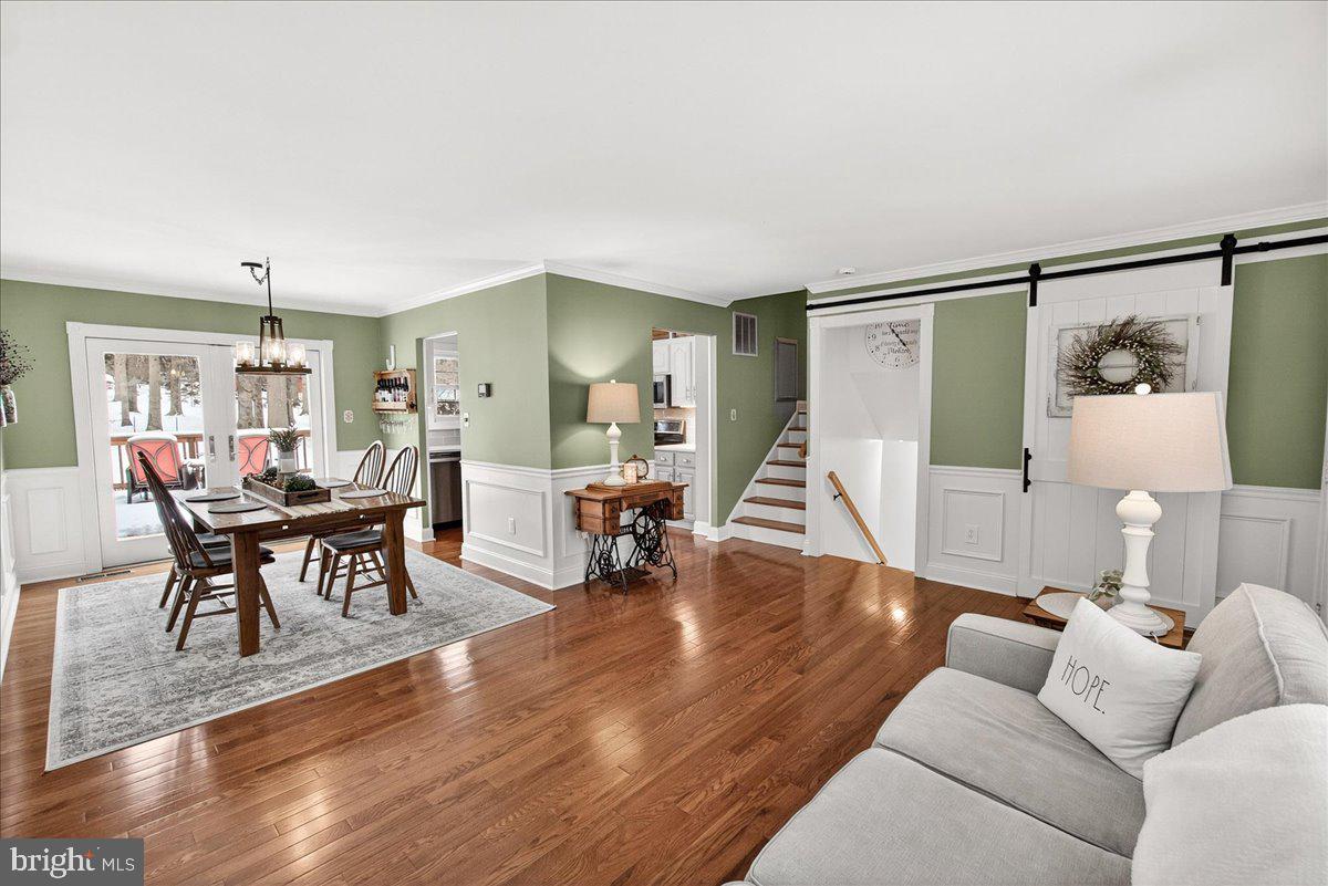 24013 Bush Hill Road Gaithersburg, MD 20882 - Photo 8 of 38 a living room with furniture and wooden floor