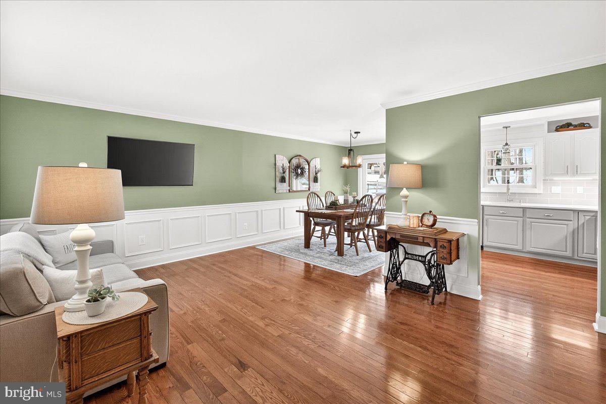 24013 Bush Hill Road Gaithersburg, MD 20882 - Photo 9 of 38 a living room with furniture and a flat screen tv