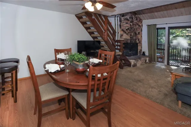 a kitchen with cabinets appliances a sink and a window