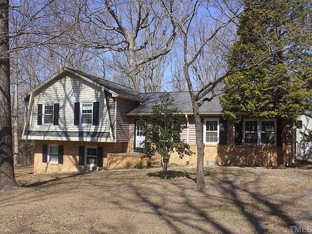530 Andover Road Durham, NC 27712 - Photo 1 of 12 a front view of a house with a yard
